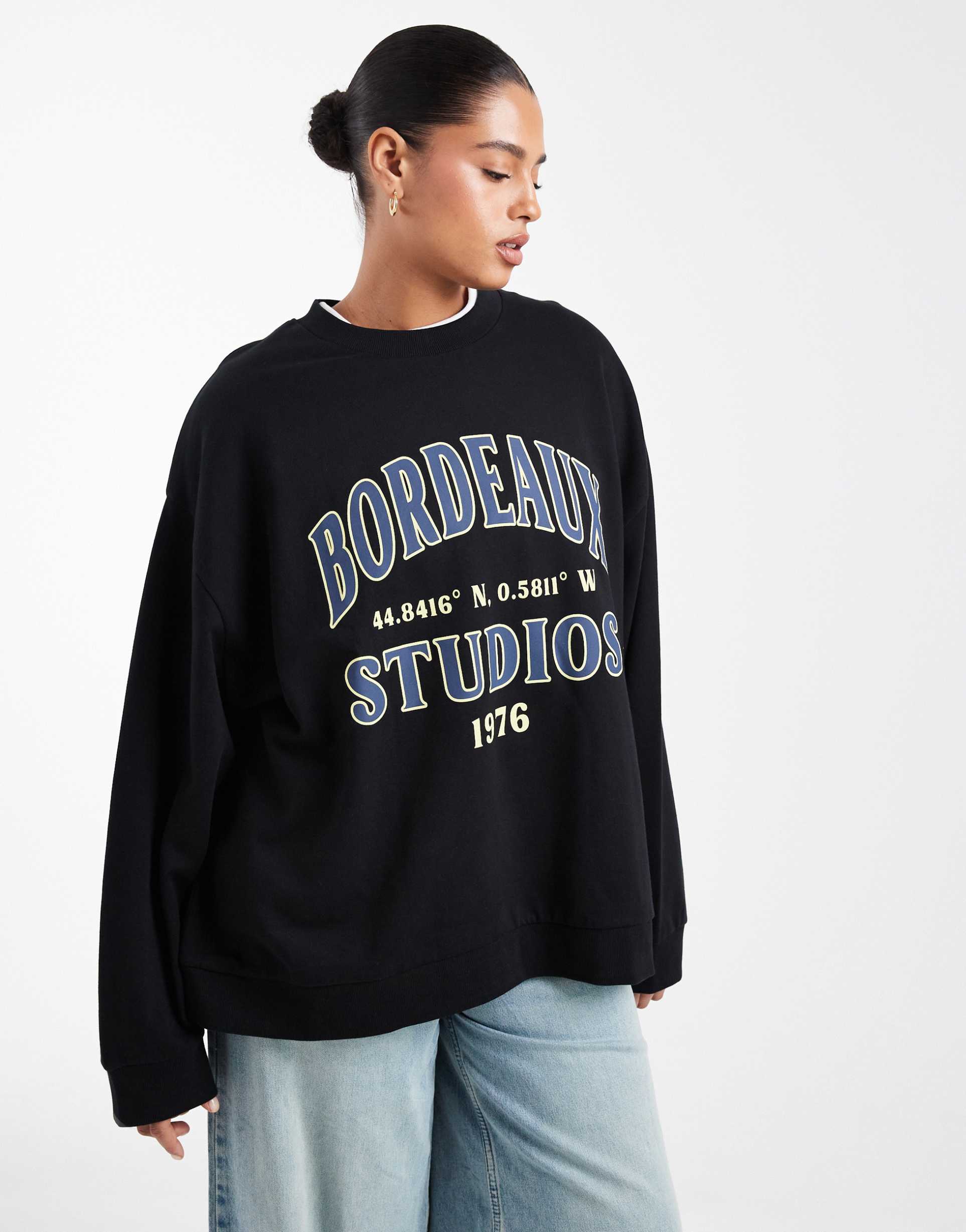 asos design curve oversized sweatshirt with bordeaux studios graphic in black