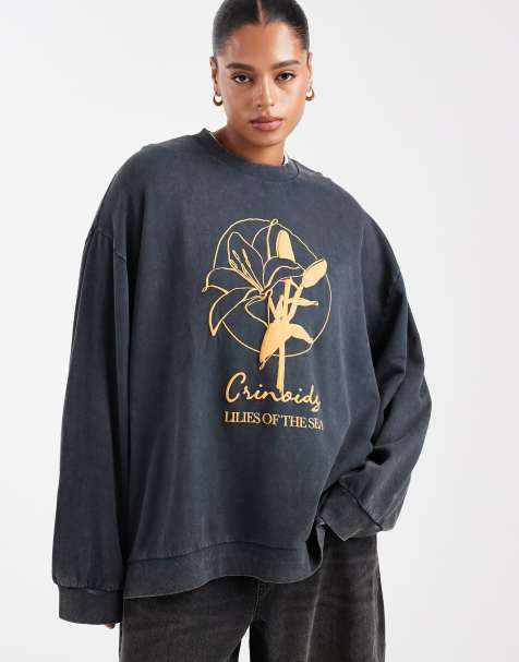 ASOS DESIGN Curve oversized sweatshirt with lily flower graphic in charcoal