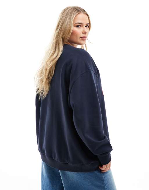 ASOS DESIGN Curve oversized sweatshirt with west coast applique graphic in navy ASOS