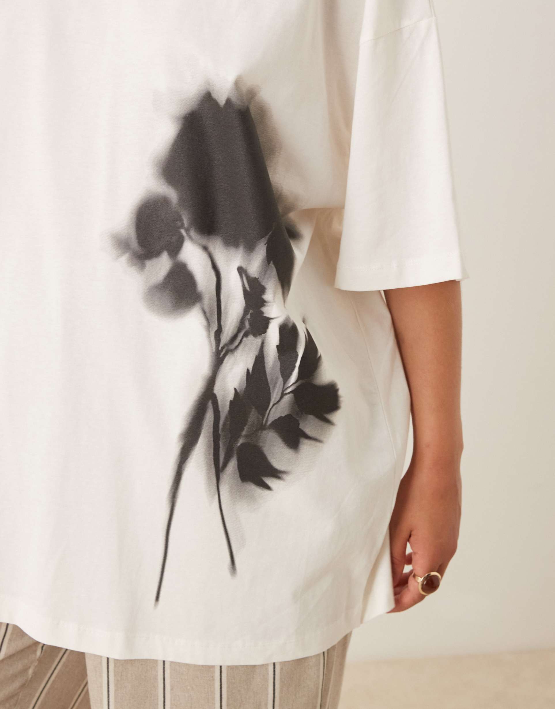 asos design curve oversized t-shirt with blurred floral graphic in cream