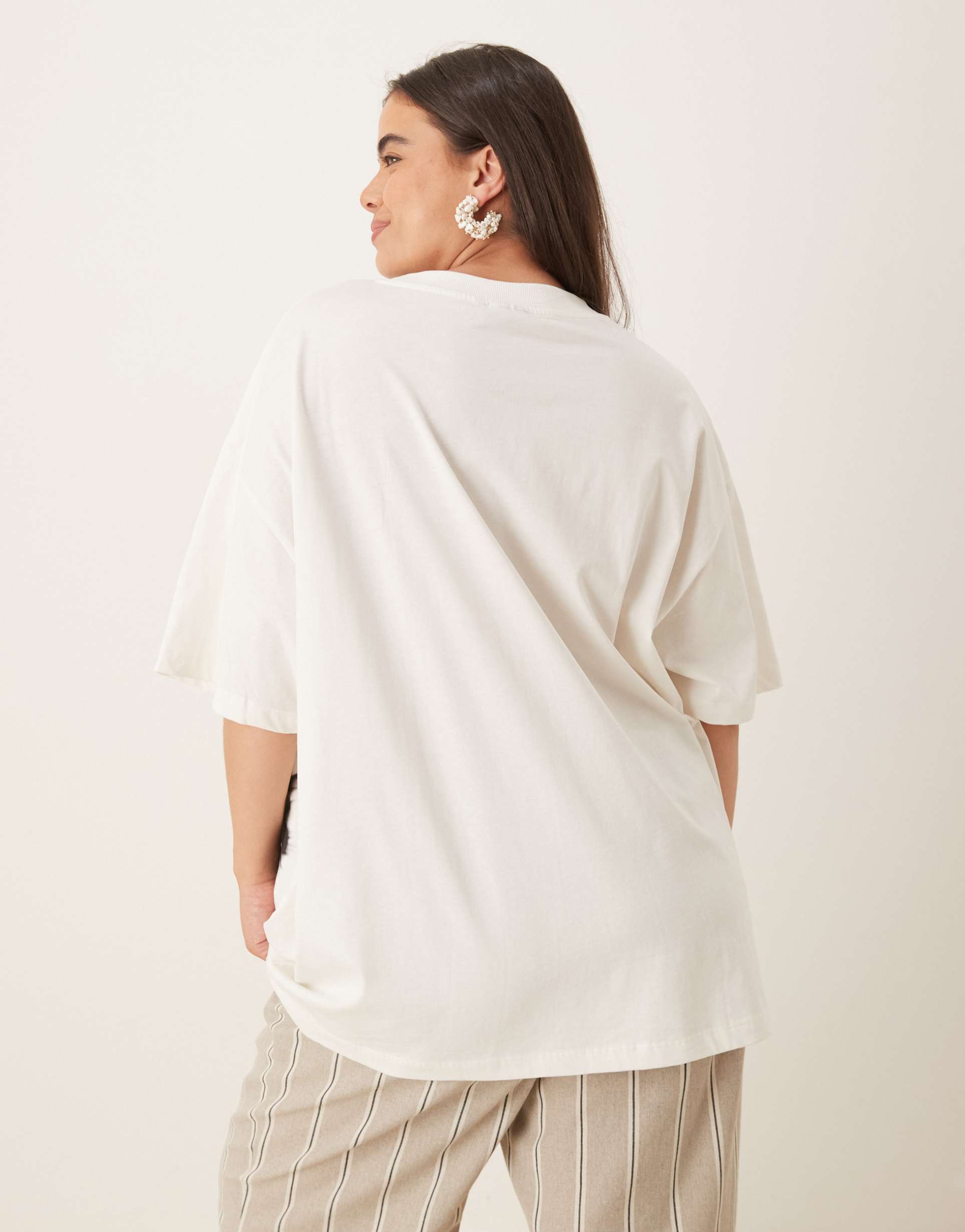 asos design curve oversized t-shirt with blurred floral graphic in cream