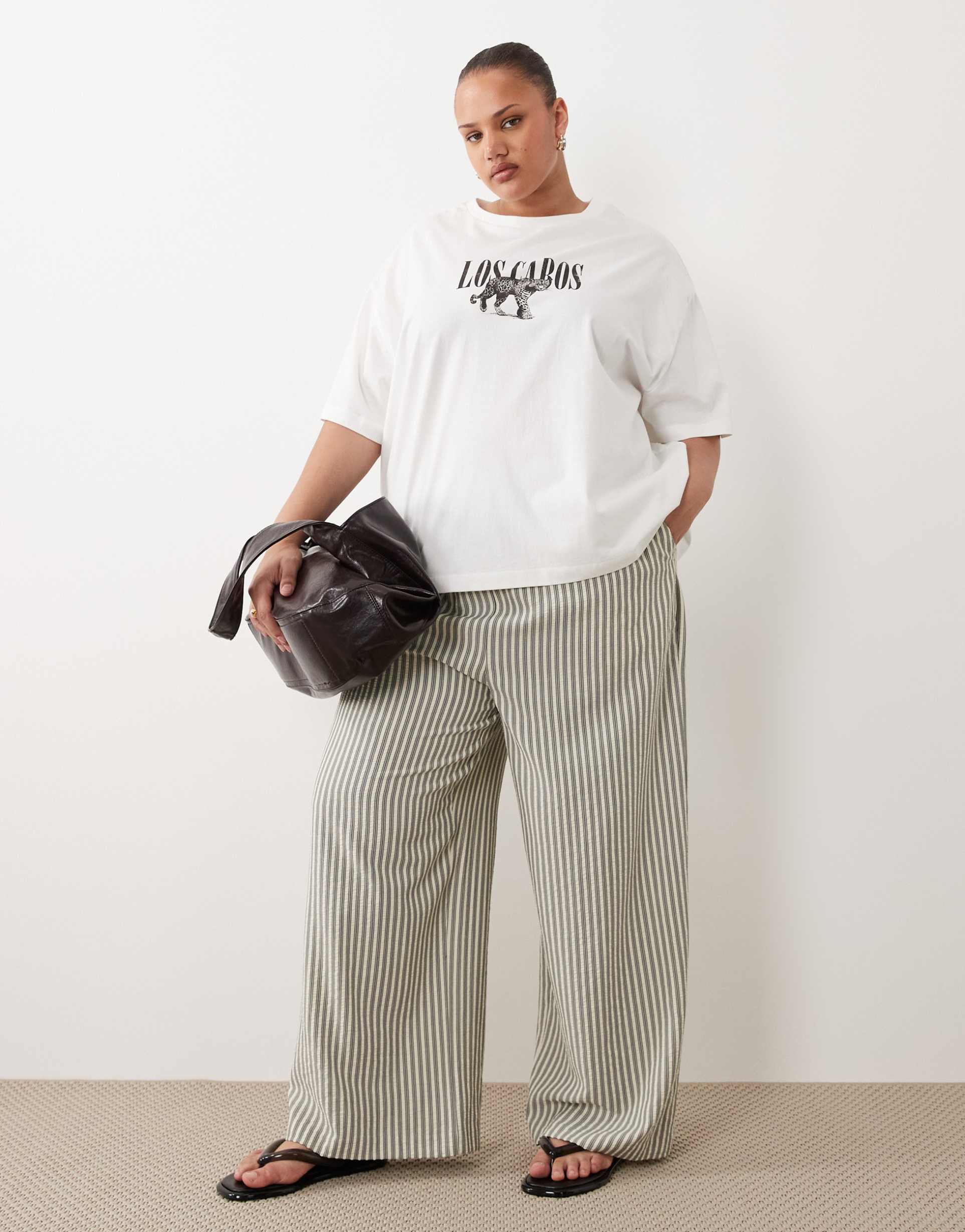 asos design curve oversized t-shirt with distressed los cabos graphic in cream