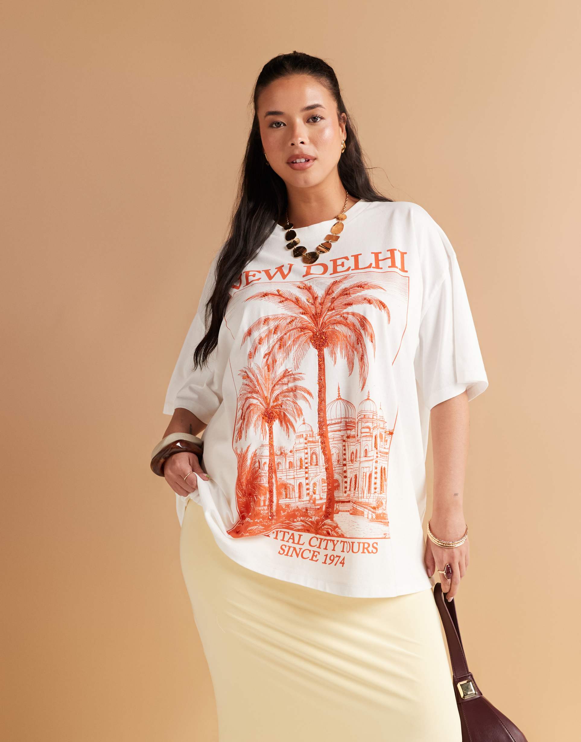 asos design curve oversized t-shirt with new delhi embellished graphic in cream