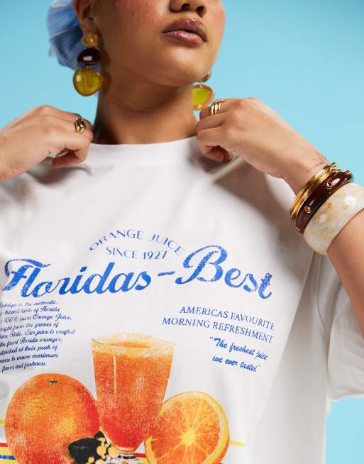 ASOS DESIGN Curve oversized t-shirt with orange juice graphic in white