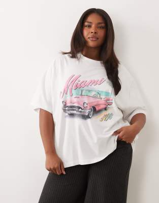 ASOS DESIGN Curve Oversized T-shirt with pink vintage car graphic in white