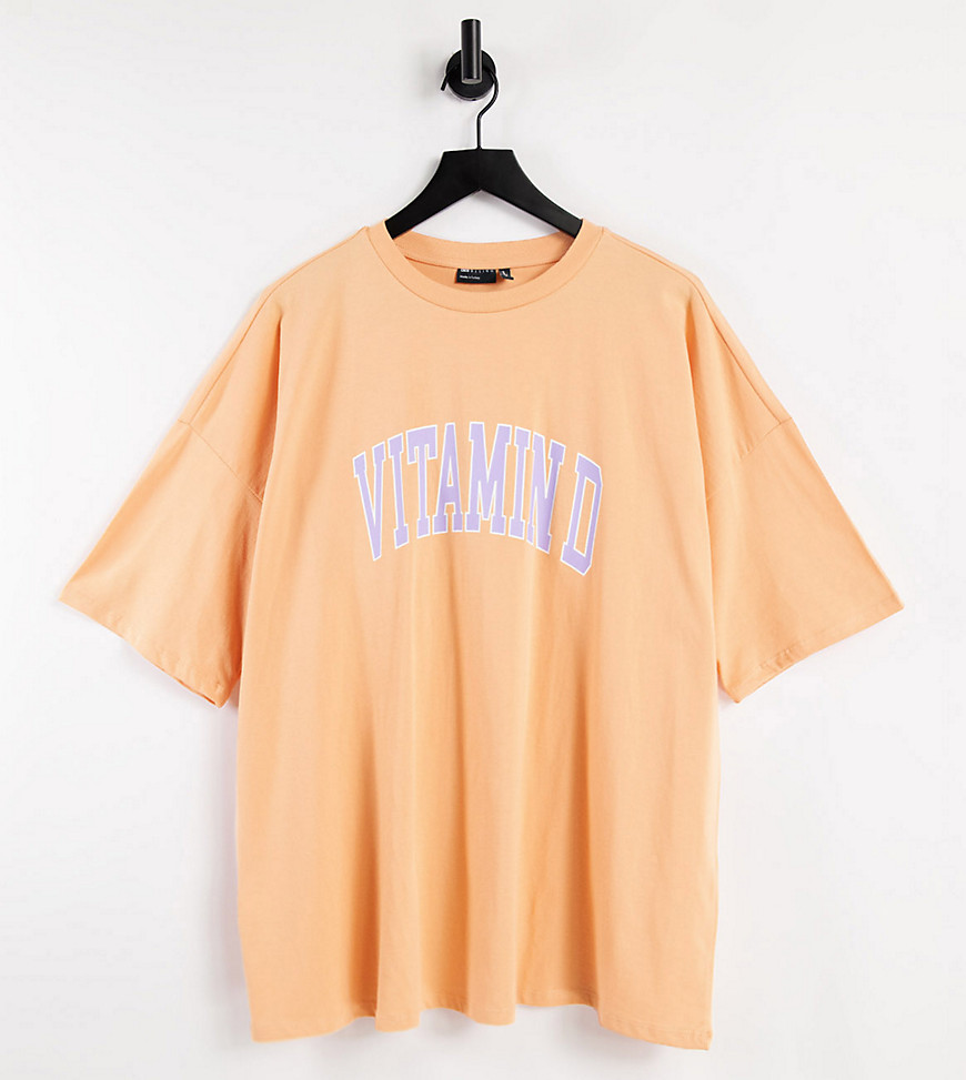 ASOS DESIGN Curve oversized t-shirt with vit-d graphic in washed coral-Orange