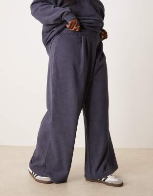ASOS DESIGN Curve oversized wide leg trackies in washed navy (part of a set)
