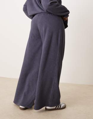 ASOS DESIGN Curve oversized wide leg trackies in washed navy (part of a set)