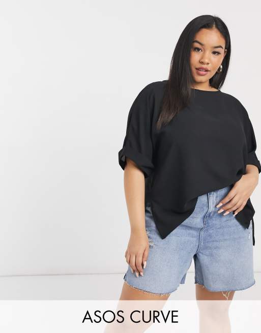 ASOS DESIGN Curve oversized woven tee with roll sleeve in black | ASOS