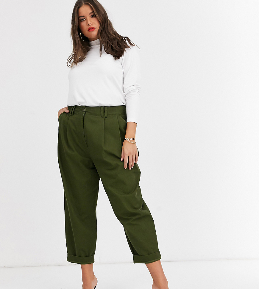 Plus-size trousers by ASOS DESIGN Part of our responsible edit High-rise waist Concealed fly Side pockets and two back pockets Regular, tapered fit A standard cut around the thigh with a narrow shape through the leg