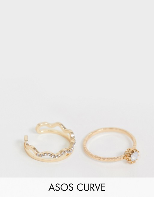 ASOS DESIGN Curve pack of 2 rings with faux stone and crystal wave design in gold