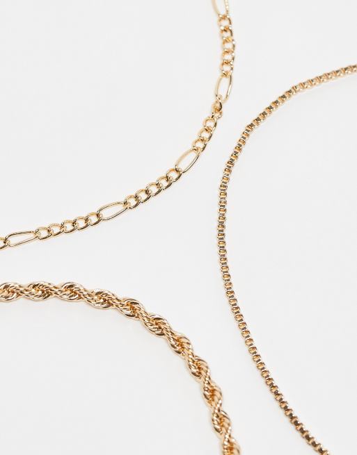 ASOS DESIGN Curve pack of 3 anklets with mixed chain design in gold tone ASOS
