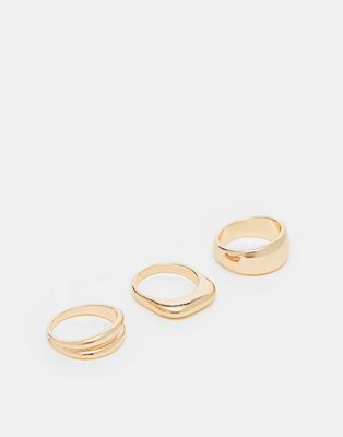 ASOS DESIGN Curve pack of 3 rings with chunky abstract design in gold tone - ASOS Price Checker