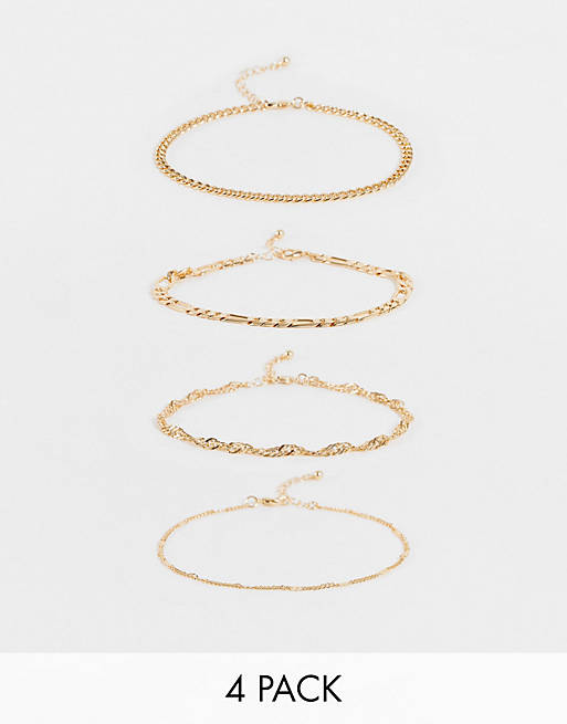ASOS DESIGN Curve pack of 4 anklets in mixed chains in gold tone | ASOS