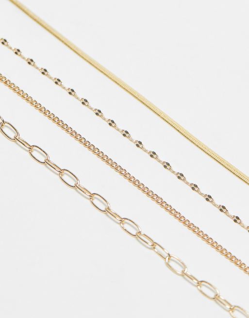 ASOS DESIGN Curve pack of 4 anklets with chain design in gold tone, 2 of 4