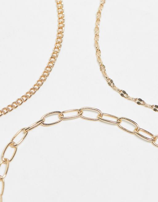 ASOS DESIGN Curve pack of 4 anklets with chain design in gold tone, 4 of 4