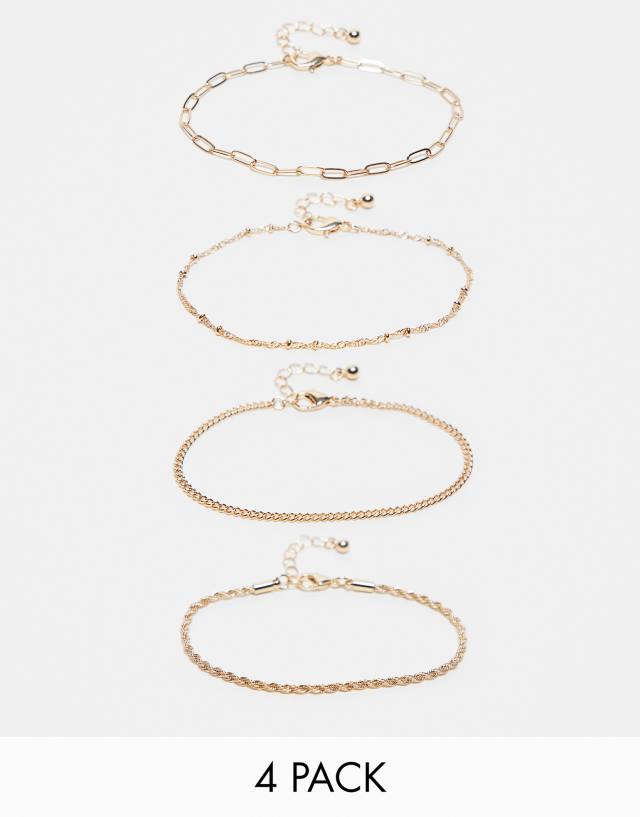 ASOS Curve - ASOS DESIGN Curve pack of 4 fine chain bracelets in gold tone