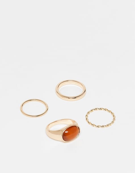 ASOS DESIGN Curve pack of 4 mixed rings with faux semi precious stones in gold tone - view 1