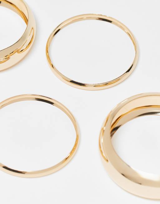 ASOS DESIGN Curve pack of 4 shiny gold bangles