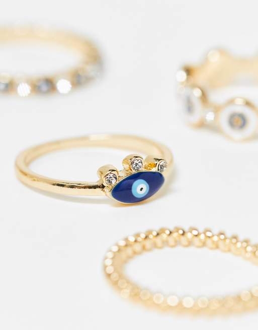 ASOS DESIGN Curve pack of 5 rings with mixed eye design in gold tone, 2 of 4
