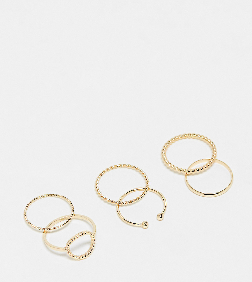 ASOS DESIGN Curve pack of 6 rings with open circle detail in gold tone