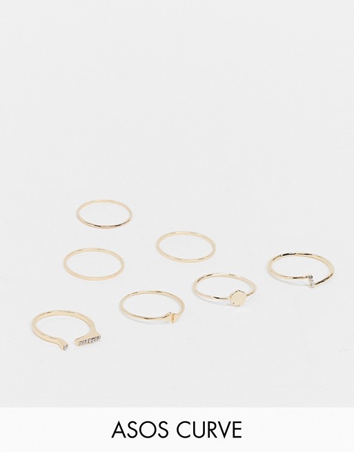 ASOS DESIGN Curve pack of 7 rings with mixed designs in gold tone