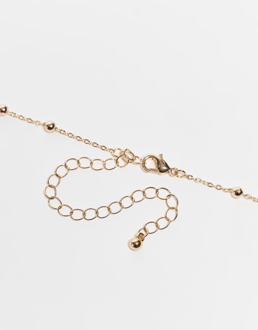 ASOS DESIGN Curve - Pakke med 2 guldfarvede mavekæder med prik- og stregkæde og fin kæde, 2 af 3