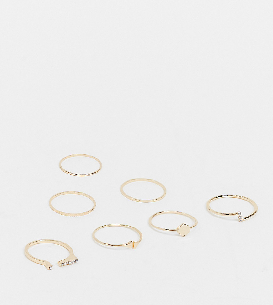 ASOS DESIGN Curve - Pakke med 7 guldfarvede ringe i blandede designs