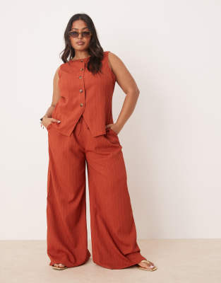 ASOS DESIGN Curve - Palazzo-Hose in Rostrot mit Knitterstruktur, Kombiteil-Orange