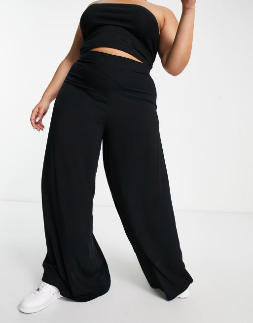 270+ Black Palazzo Pants Stock Photos, Pictures & Royalty-Free Images -  iStock