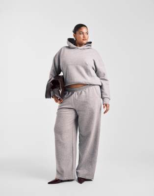 ASOS DESIGN Curve - Pantalon de jogging ample à envers brossé - Gris chiné