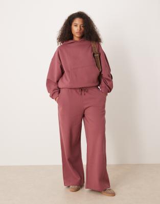 ASOS DESIGN Curve - Pantalon de jogging ample en tissu épais 500 g/m² de qualité supérieure à surpiqûres - Rose foncé-Violet