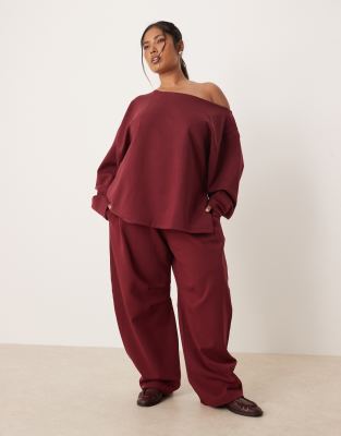 ASOS DESIGN Curve - Pantalon de jogging large en maille interlock - Bordeaux-Rouge 2XL