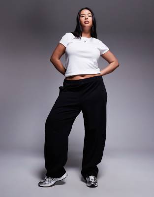 ASOS DESIGN Curve - Pantalon de jogging large en maille interlock - Noir