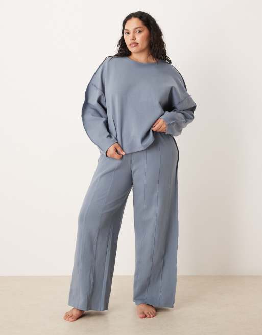 ASOS DESIGN Curve - Pantalon de jogging ultra ample en maille interlock avec surpiqûres - Bleu