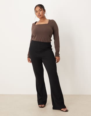 ASOS DESIGN Curve - Pantalon évasé en tissu épais côtelé - Noir 3XL
