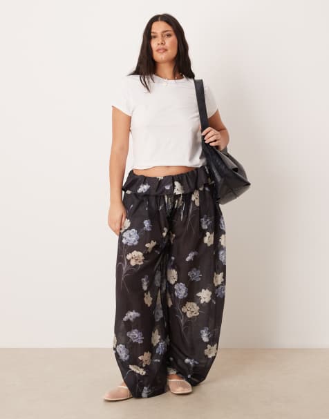 ASOS DESIGN Curve - Pantalon fluide à imprimé fleuri - Noir - view 1