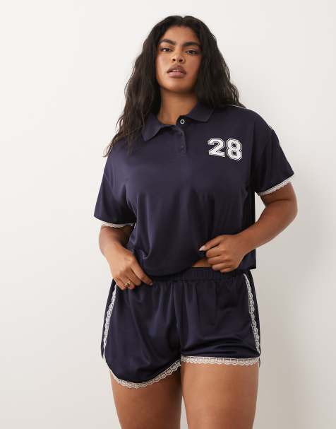 ASOS DESIGN Curve - Pantaloncini da corsa in tricot blu navy con dettagli in pizzo in coordinato - view 1