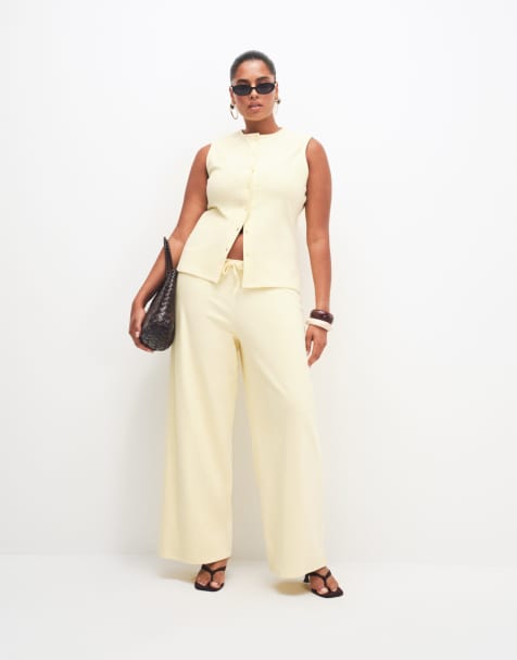 ASOS DESIGN Curve - Pantaloni a fondo ampio testurizzati color latticello in coordinato - view 1