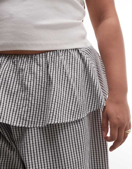 ASOS DESIGN Curve - Pantaloni a palloncino con gonna sovrapposta a quadri bianchi e neri, 4 di 5