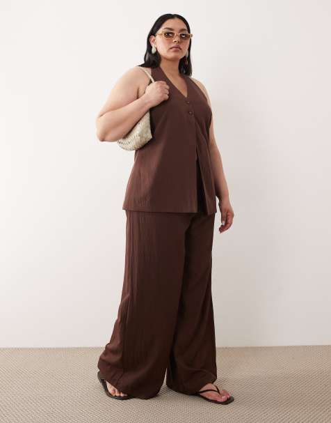 ASOS DESIGN Curve - Pantaloni fluidi sartoriali a fondo ampio marroni - view 1