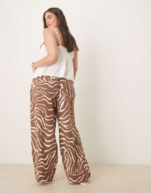 ASOS DESIGN Curve Pantaloni in mussola zebrati con bordi grezzi