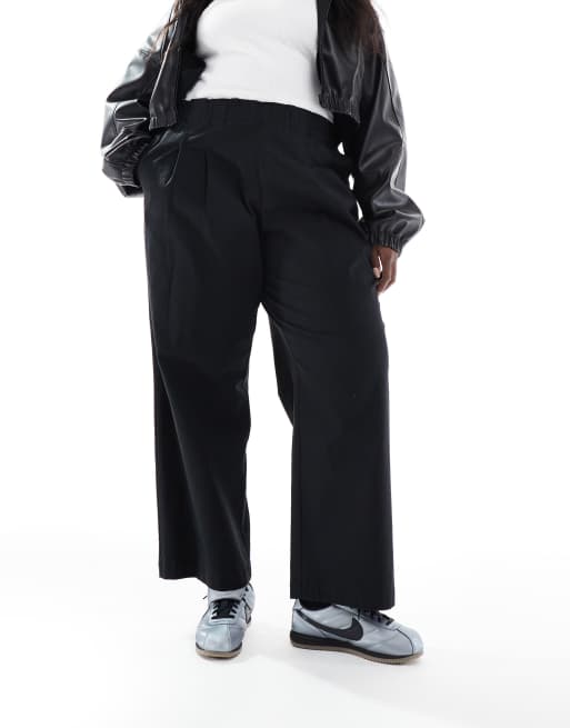 ASOS DESIGN Curve - Pantaloni nero slavato larghi a fondo ampio, 2 di 5