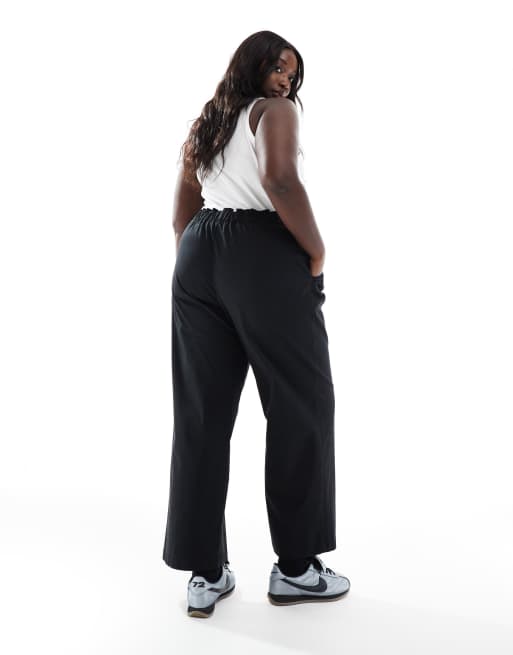 ASOS DESIGN Curve - Pantaloni nero slavato larghi a fondo ampio, 5 di 5