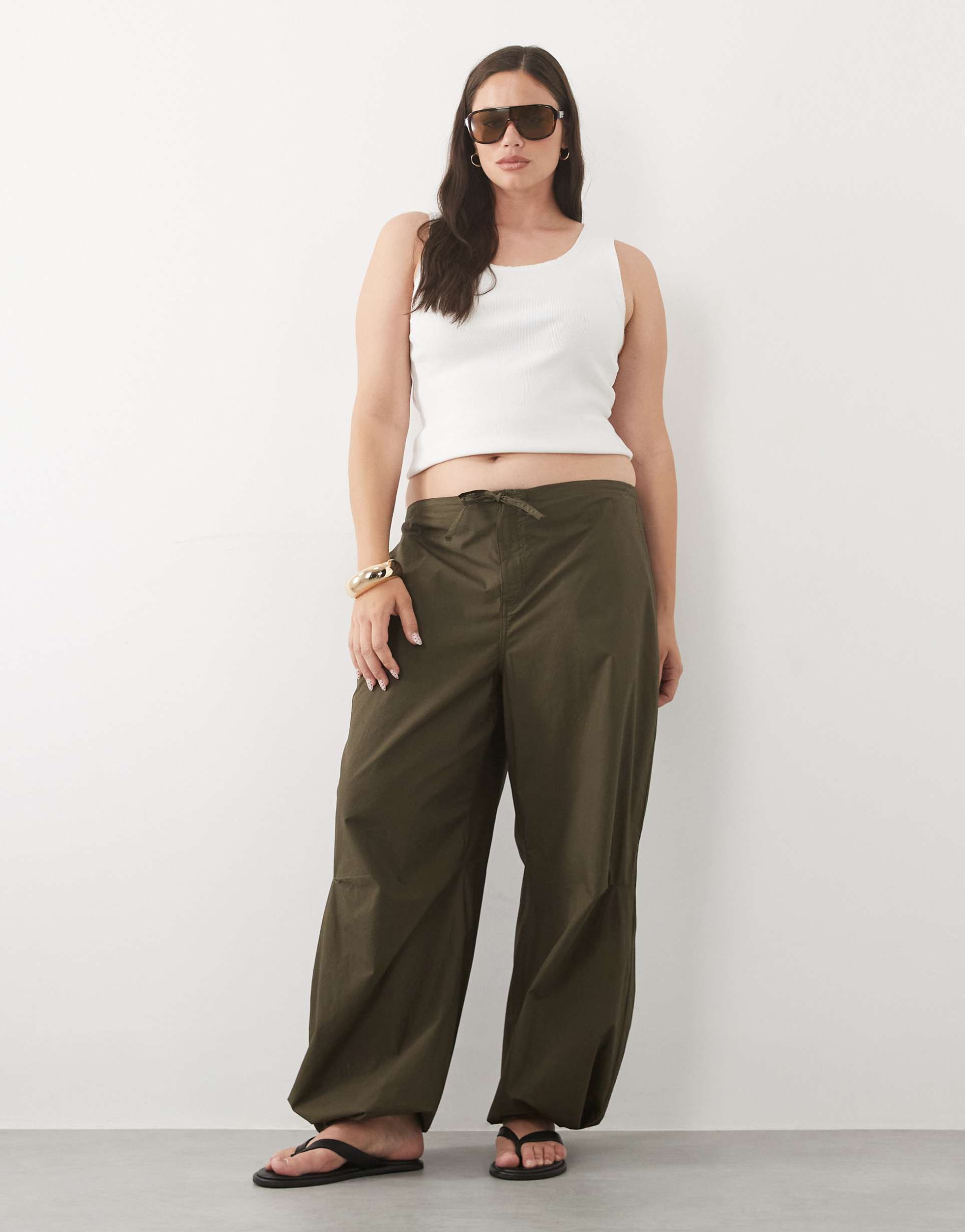 asos design curve parachute pants with toggle hem detail in khaki