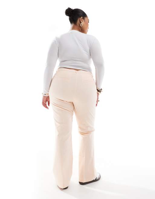 ASOS DESIGN Curve patch pocket flare pants in apricot