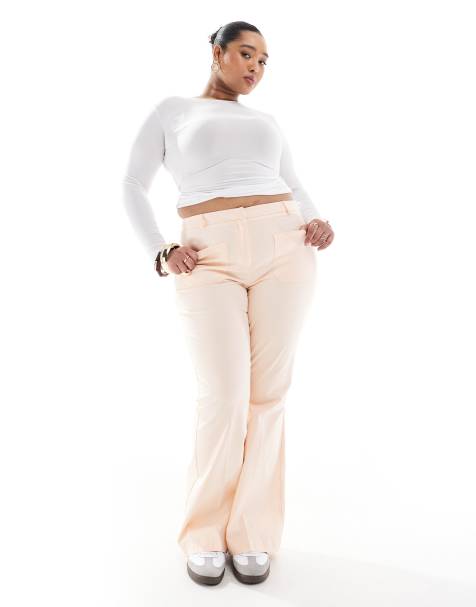 ASOS DESIGN Curve patch pocket flare trousers in apricot - view 1