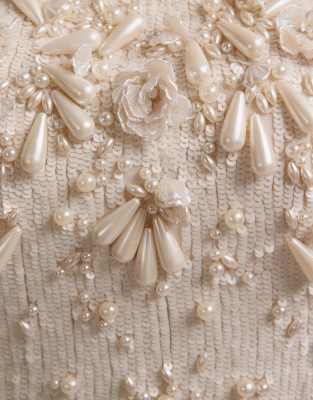 asos design embellished mini dress with drape pearl detail ASOS Premium Draped Pearl Mini Dress in Natural