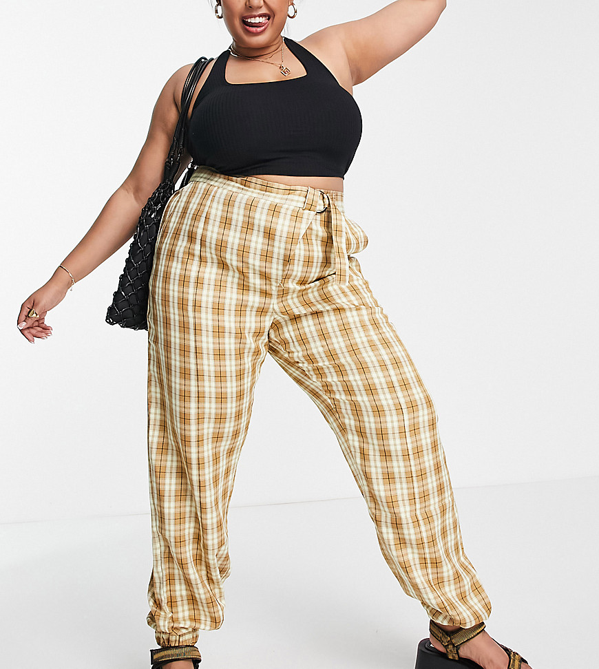 ASOS DESIGN Curve peg pants with asymmetric fly and front seam detail in check-Multi