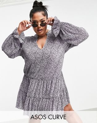 ASOS DESIGN Curve plisse v neck long sleeve mini dress with tiered hem in lilac and black ditsy - ASOS Price Checker
